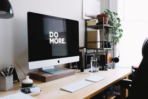 Photo of a computer and a desk